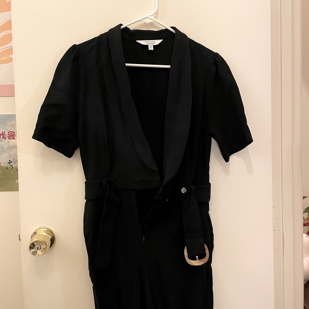 Long black jumpsuit with buckle